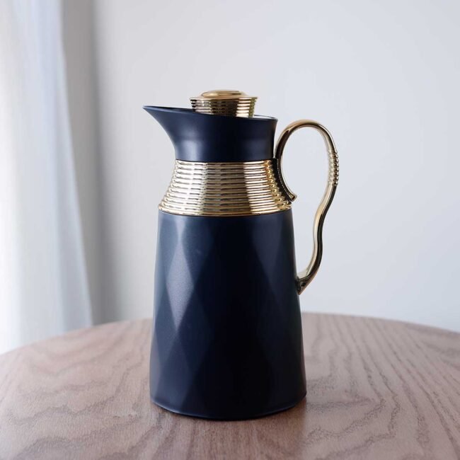 Gold and black thermos