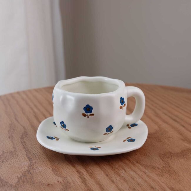 Handmade mug with blue roses