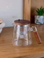 Glass herbal Teapot and handle made of a combination of wood and glass