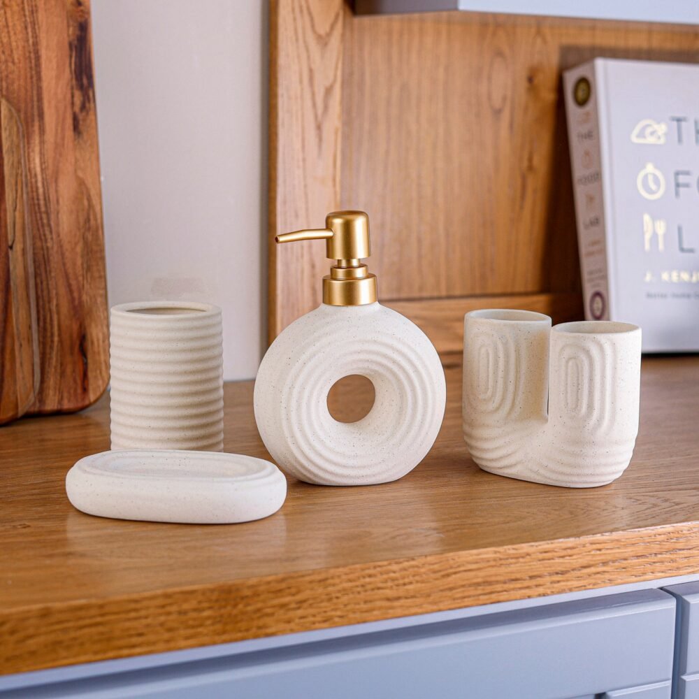 4-Piece Modern Bathroom Accessories Set with Artistic Design - Image 1