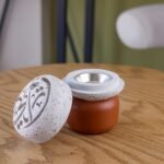White Textured Rounded Ceramic Incense Burner with a Brown Wooden Base