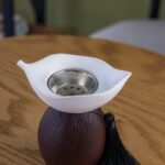 White Leaf Ceramic Incense Burner with a Brown Wooden Base - Image 2