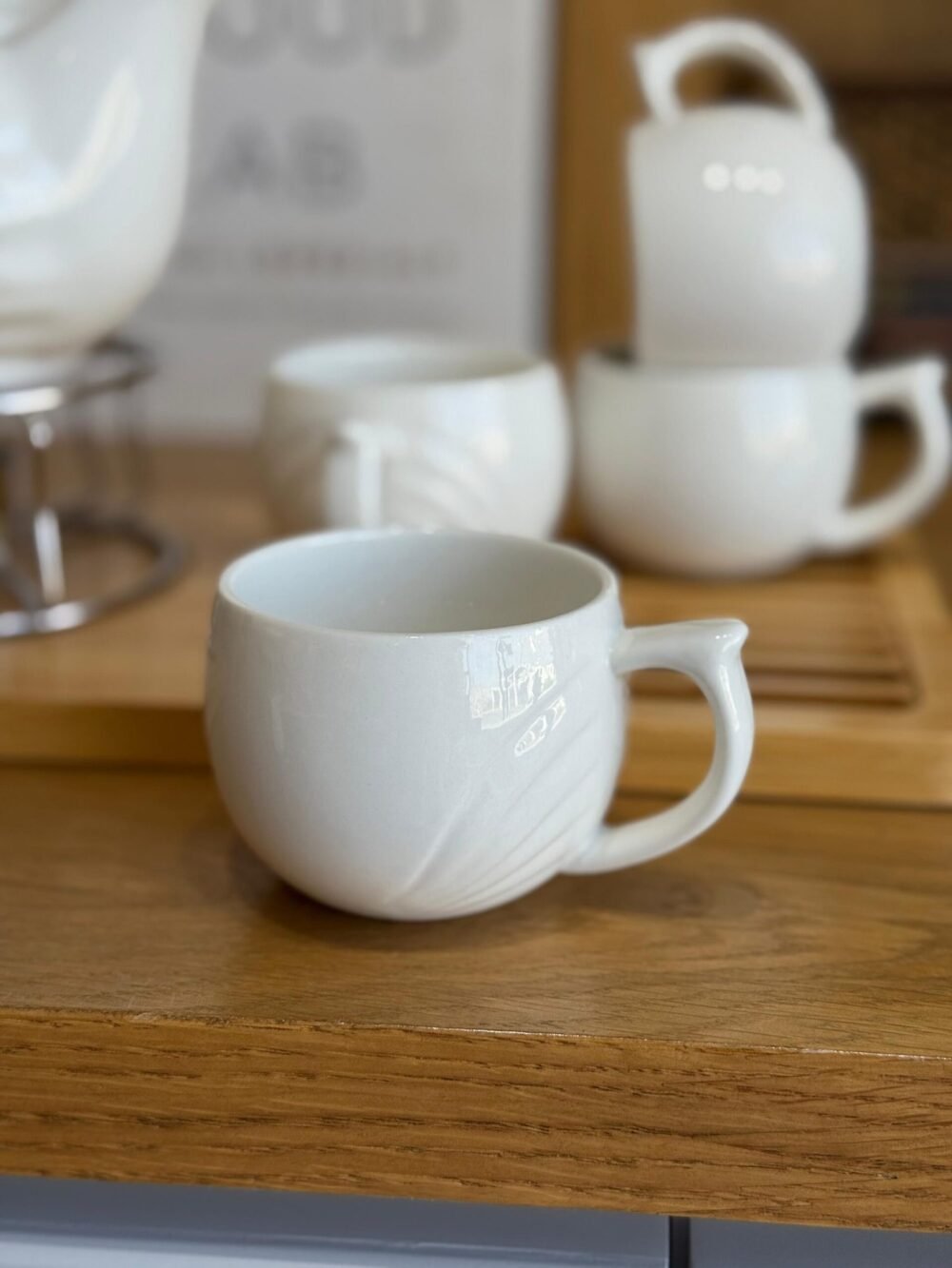 Porcelain Tea Set with Teapot, 4 Cups, and Candle Warming Base - Image 5